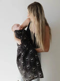 Forever French Smile Muslin Swaddle